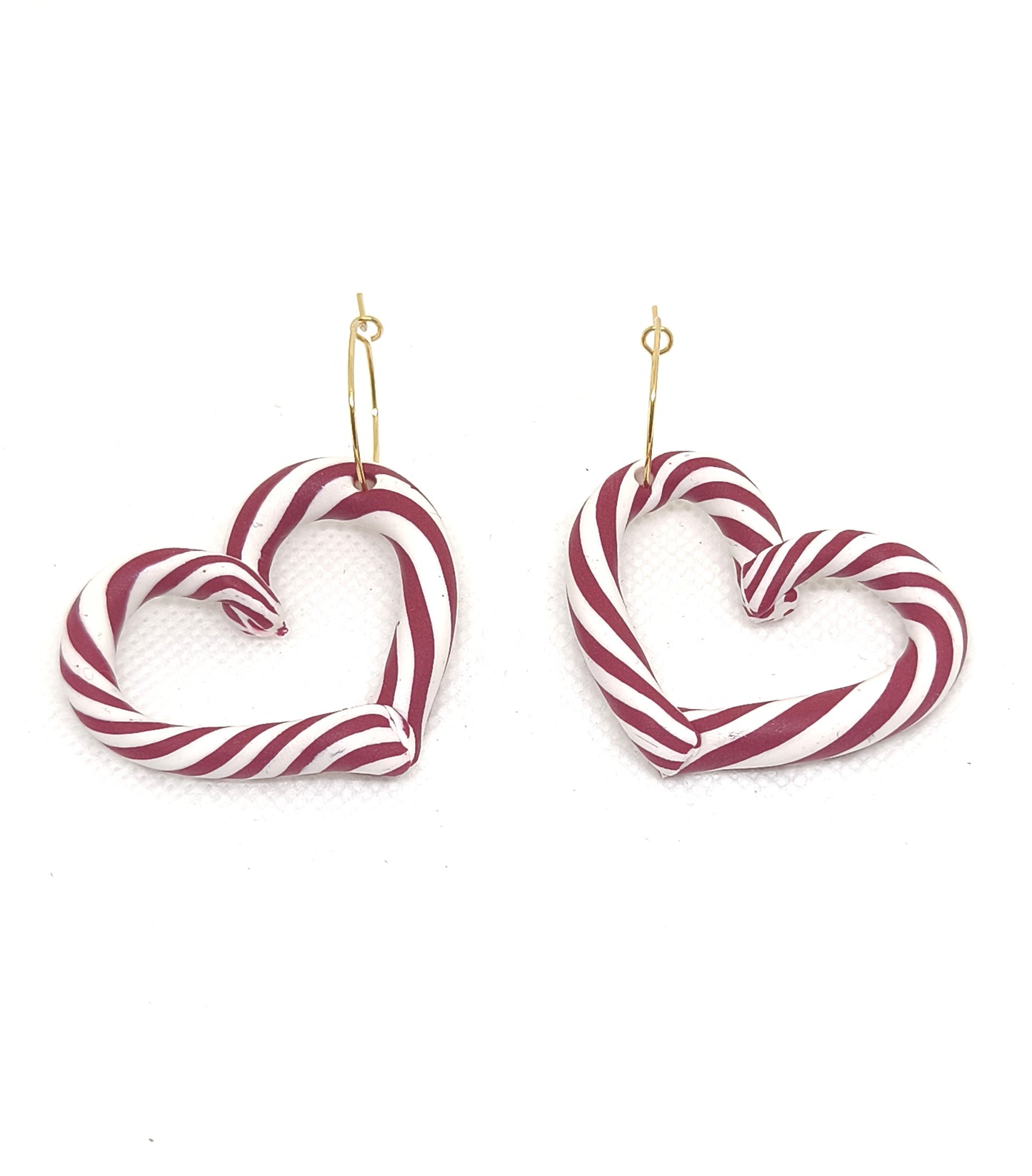 Red and white candy cane heart hoop earrings with 18k gold-plated hoops